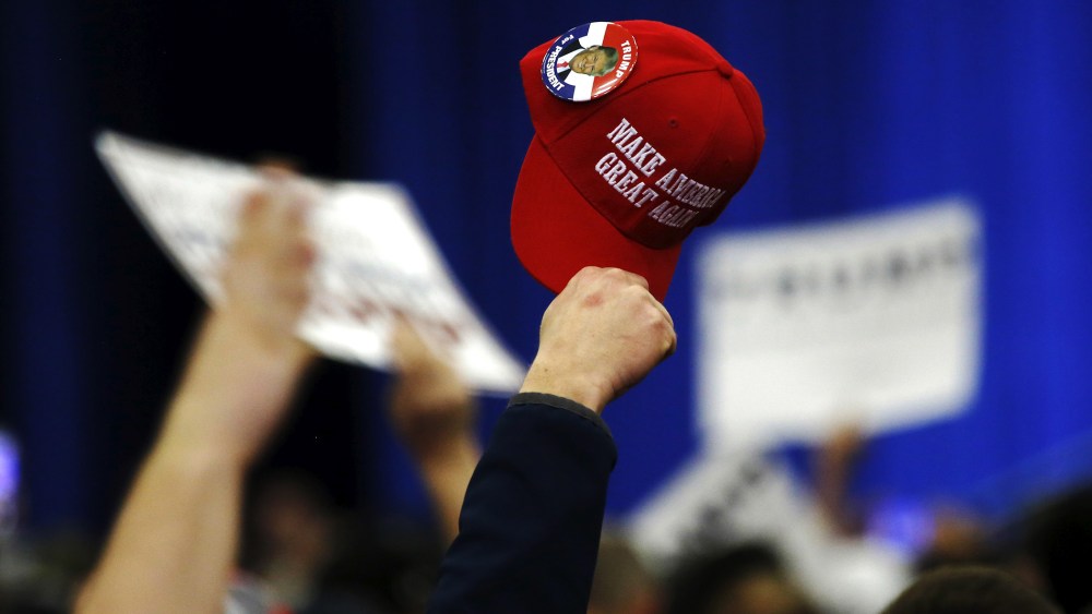 Supporters cheer in support of Republican presidential candidate Donald Trump as he speaks at a Super Tuesday campaign rally in Louisville, Ky., March 1, 2016. (Photo by Chris Bergin/Reuters)