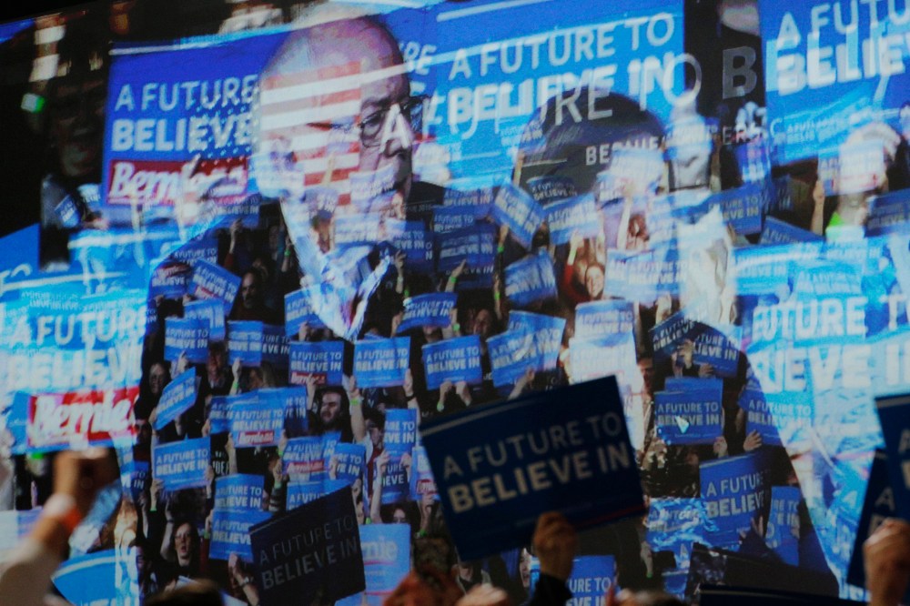 The video screen shows Democratic presidential candidate and Senator Bernie Sanders, his wife Jane and their supporters at his Super Tuesday rally in Burlington, Vt., March 1, 2016. (Photo by Brian Snyder/Reuters)