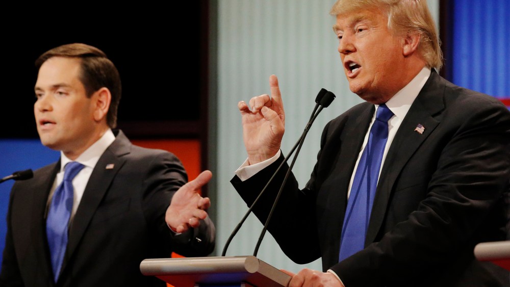 Republican presidential candidate Marco Rubio and rival candidate Donald Trump argue at the same time at the debate in Detroit, Mich., March 3, 2016. (Photo by Jim Young/Reuters)