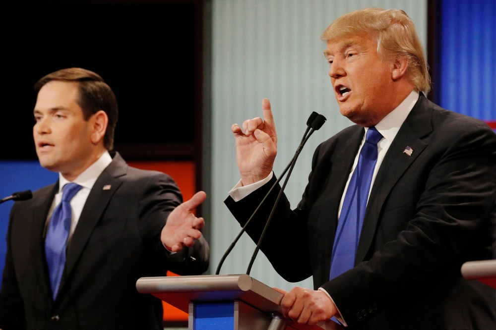 Republican presidential candidate Marco Rubio and rival candidate Donald Trump argue at the same time at the debate in Detroit, Mich., March 3, 2016. (Photo by Jim Young/Reuters)