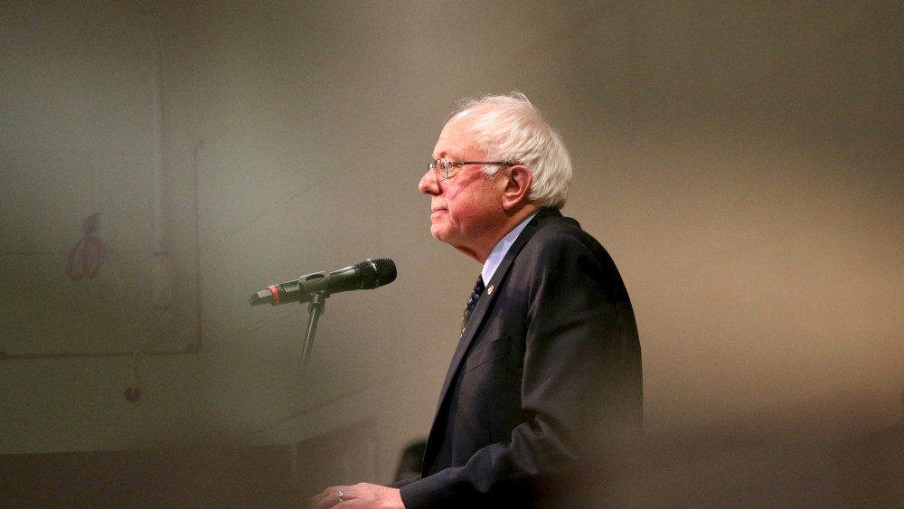 Vermont Senator and Democratic U.S. presidential candidate Bernie Sanders is seen through a window as he speaks at a town hall forum at the Olivet Institutional Baptist Church in Cleveland, Ohio, March 5, 2016. (Photo by Aaron Josefczyk/Reuters)