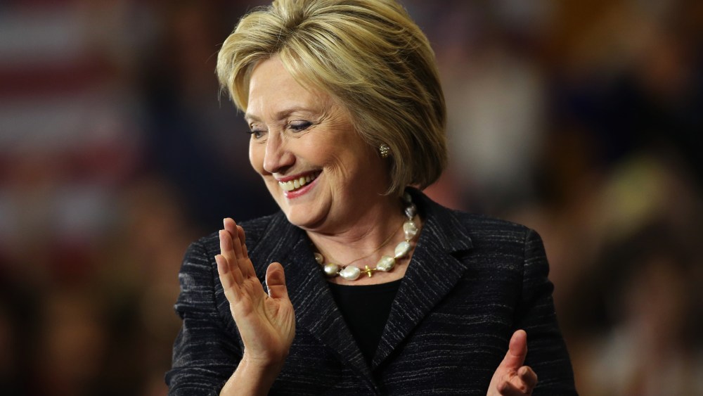 Democratic presidential candidate Hillary Clinton claps as she speaks to supporters about primary voting results in Michigan and other states, at her campaign rally in Cleveland, Ohio, March 8, 2016. (Photo by Aaron Josefczyk/Reuters)