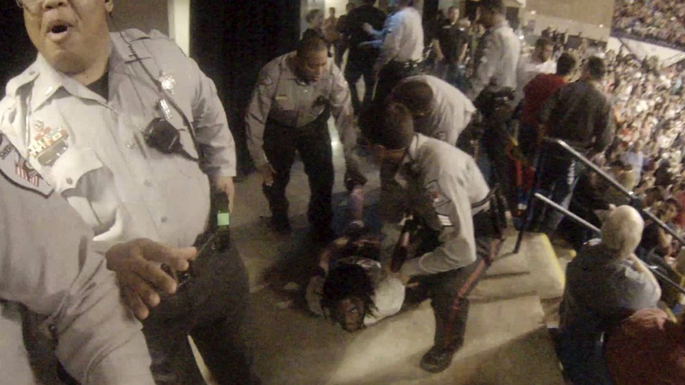 Rakeem Jones lies on the ground while being removed by deputies from a Donald Trump rally in Fayetteville, N.C., March 9, 2016. (Photo by Handout/Reuters)