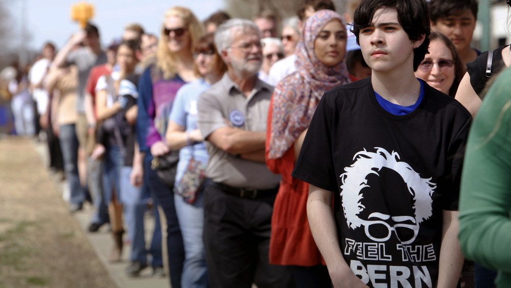Supporters of Democratic presidential candidate Bernie Sanders line up to enter the venue of his campaign rally in Raleigh, N.C., March 11, 2016. (Photo by Jonathan Drake/Reuters)
