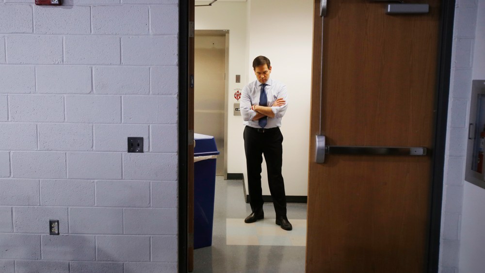 Republican presidential candidate Marco Rubio has a moment to himself before being introduced at a campaign event at Palm Beach Atlantic University in West Palm Beach, Fla., March 14, 2016. (Photo by Carlo Allegri/Reuters)
