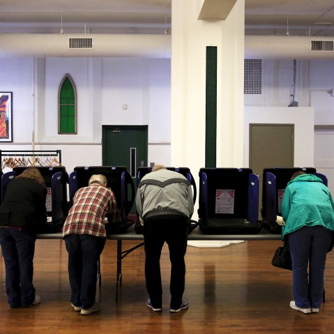 Voters cast their ballots for the Ohio primary at Saint Patrick's Social Hall in Youngstown, Ohio, March 15, 2016. (Photo by Aaron Bernstein/Reuters)