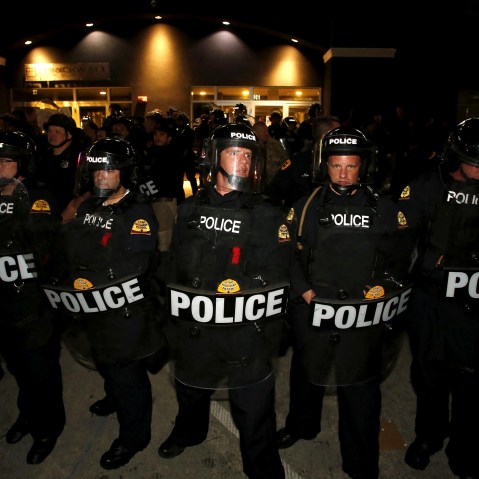 Law enforcement officers stand guard after Republican U.S. presidential candidate Donald Trump spoke at a campaign rally in Salt Lake City, Utah, March 18, 2016. (Photo by Jim Urquhart/Reuters)