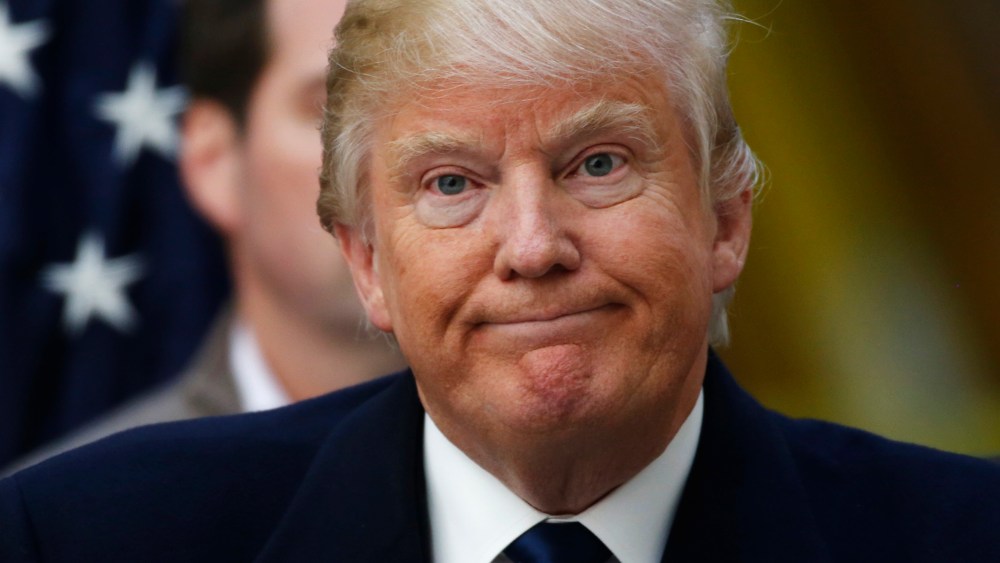 Republican presidential candidate Donald Trump reacts during a news conference at the construction site of the Trump International Hotel at the Old Post Office Building in Washington, March 21, 2016. (Photo by Jim Bourg/Reuters)