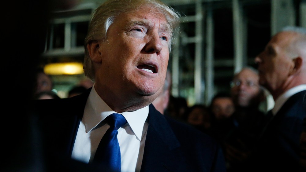 Republican presidential candidate Donald Trump speaks to reporters as he leads the news media at the Trump International Hotel at the Old Post Office Building in Washington, March 21, 2016. (Photo by Jim Bourg/Reuters)