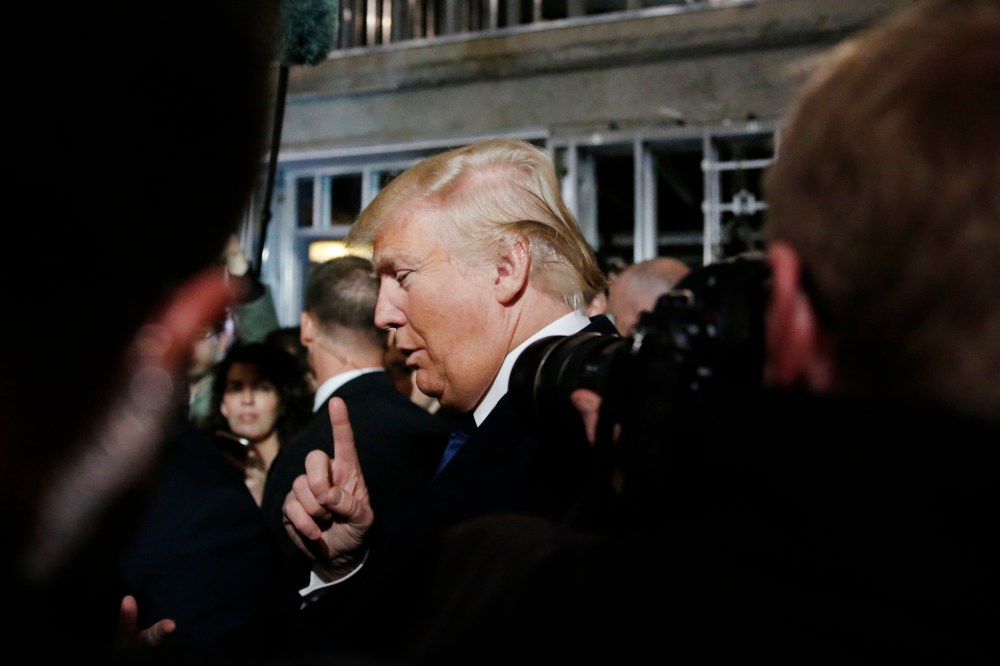 Republican presidential candidate Donald Trump speaks to reporters while touring the construction site of the Trump International Hotel at the Old Post Office Building, Washington, DC, March 21, 2016. (Photo by Jim Bourg/Reuters)