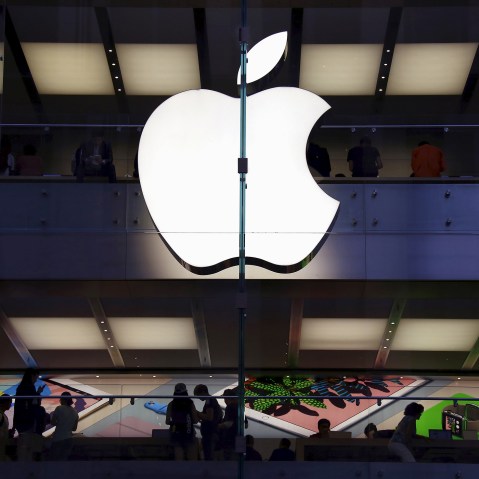 Customers can be seen inside the Apple store in central Sydney, Australia, in this picture taken March 18, 2016. (Photo by David Gray/Reuters)