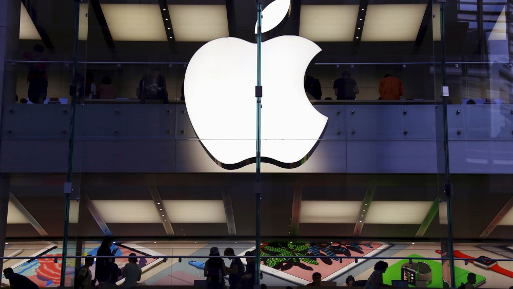 Customers can be seen inside the Apple store in central Sydney, Australia, in this picture taken March 18, 2016. (Photo by David Gray/Reuters)