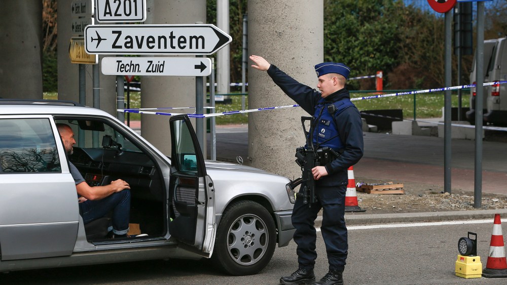 A Belgian police officer controls the access to Belgian international airport of Zaventem airport, in Zaventem, Belgium, April 1, 2016. (Photo by Yves Herman/Reuters)