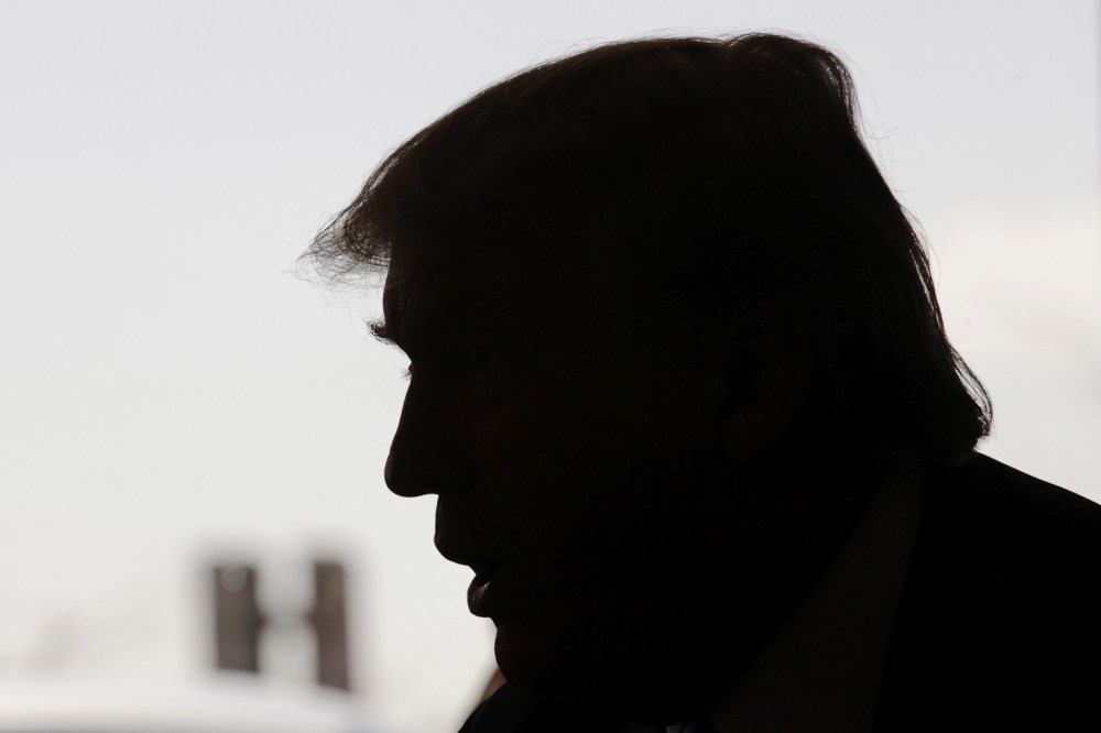 Republican presidential candidate Donald Trump talks with the media as he stops in for breakfast at Miss Katie's Diner, while campaigning in Milwaukee, Wis., April 3, 2016. (Photo by Darren Hauck/Reuters)