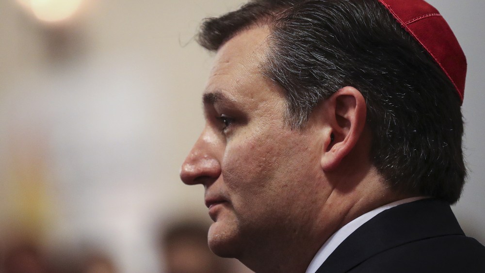 U.S. Republican presidential candidate Ted Cruz wears a yarmulke as he speaks to Jewish community leaders at a campaign event in the Brooklyn borough of New York, April 7, 2016.  (Photo by Carlo Allegri/Reuters)