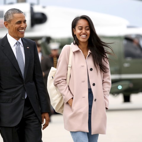 U.S. President Barack Obama and his daughter Malia walk from Marine One to board Air Force One upon their departure from O'Hare Airport in Chicago, April 7, 2016. (Photo by Kevin Lamarque/Reuters)