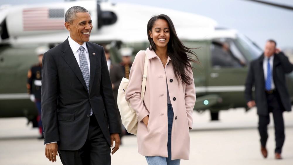 U.S. President Barack Obama and his daughter Malia walk from Marine One to board Air Force One upon their departure from O'Hare Airport in Chicago, April 7, 2016. (Photo by Kevin Lamarque/Reuters)