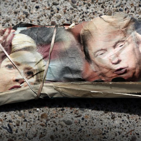 A rubber band wraps the front page of La Opinion newspaper featuring pictures of Democratic Presidential Candidate Hillary Clinton and Republican Presidential Candidate Donald Trump in Santa Ana, Calif., May 15, 2016. (Photo by Patrick T. Fallon/Reuters)