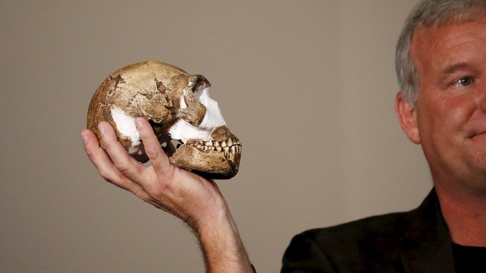 Professor Lee Berger holds a replica of the skull of a newly discovered ancient species, named "Homo naledi", during its unveiling outside Johannesburg, South Africa on Sept. 10, 2015. (Photo by Siphiwe Sibeko/Reuters)
