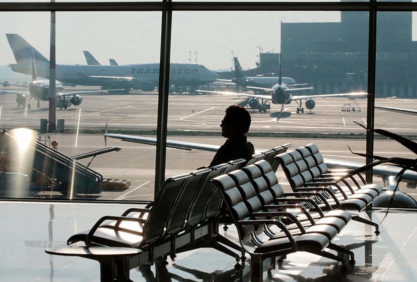 A passenger waits for his flight at Moscow's Sheremetyevo airport June 26, 2013. (Photo by Tatyana Makeyeva/Reuters)