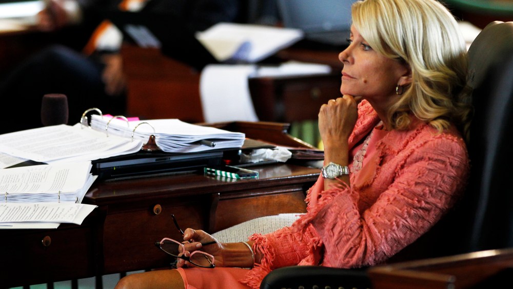 Wendy Davis listens to discussion of the Senate Bill 1 in Austin, Texas, July 12, 2013.