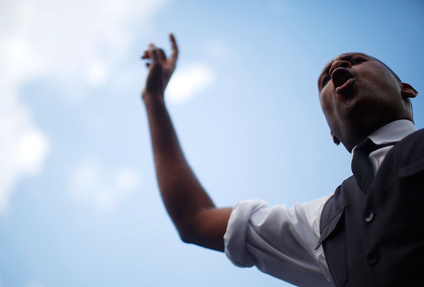 A man speaks at a rally in reaction to a not guilty verdict for George Zimmerman in New York July 14, 2013. (Photo by Eric Thayer/Reuters)