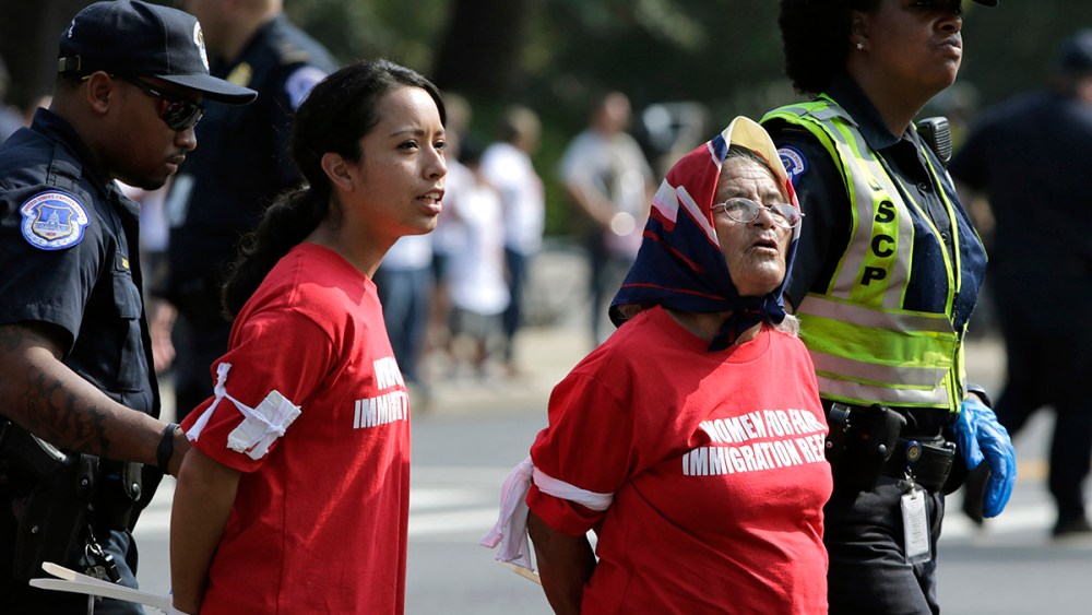 Women demanding fair immigration reform are arrested by police for blocking Independence Avenue
