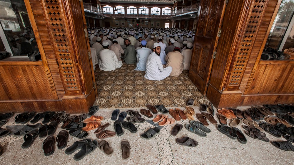 Pakistani religious students attend a lesson at Darul Uloom Haqqania, an Islamic seminary and alma mater of several Taliban leaders, in Akora Khattak, Khyber Pakhtunkhwa province Sep. 14, 2013. (Photo by Zohra Bensemra/Reuters)