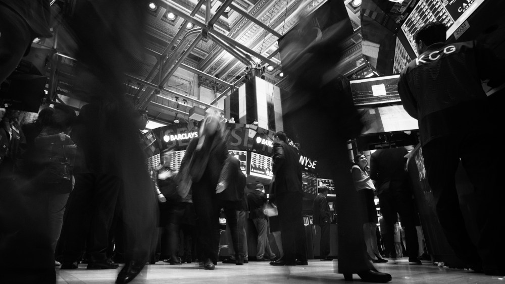 Traders work on the floor of the New York Stock Exchange in New York.