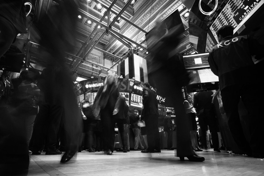 Traders work on the floor of the New York Stock Exchange in New York.