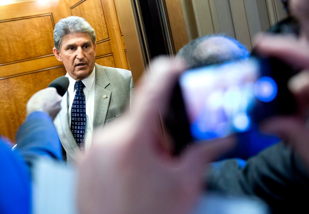 Senator Manchin speaks to reporters during the 14th day of the partial government shut down in Washington
