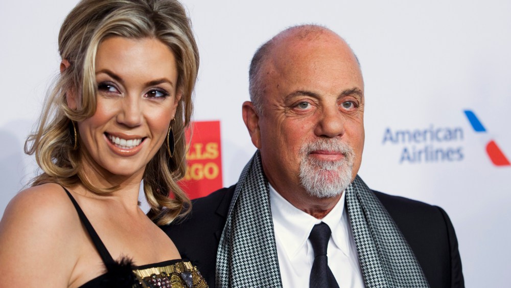 Alexis Roderick and singer Billy Joel arrive at the Elton John AIDS Foundation's 12th Annual "An Enduring Vision" benefit gala at Cipriani in N.Y. on Oct. 15, 2013. (Photo by Eduardo Munoz/Reuters)