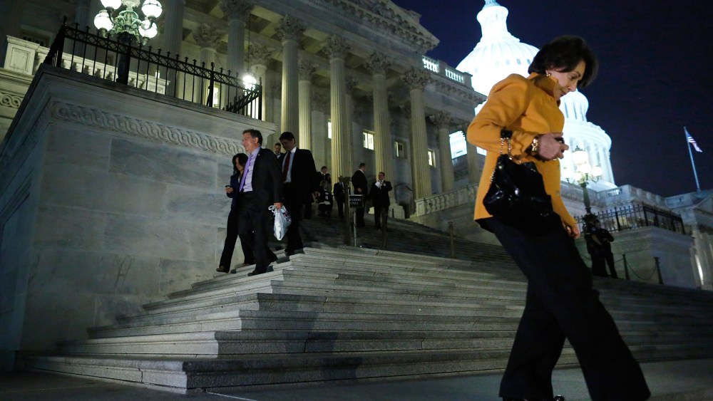 Members of the U.S. House of Representatives depart after a late-night vote on fiscal legislation to end the government shutdown, at the U.S. Capitol in Washington, October 16, 2013.
