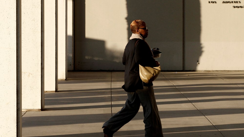 An employee arrives at the Federal Building in Los Angeles