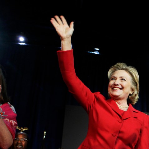 Former U.S. Secretary of State Hillary Clinton waves to the audience at an event in Falls Church, Va. on Oct. 19, 2013. (Photo by Yuri Gripas/Reuters)