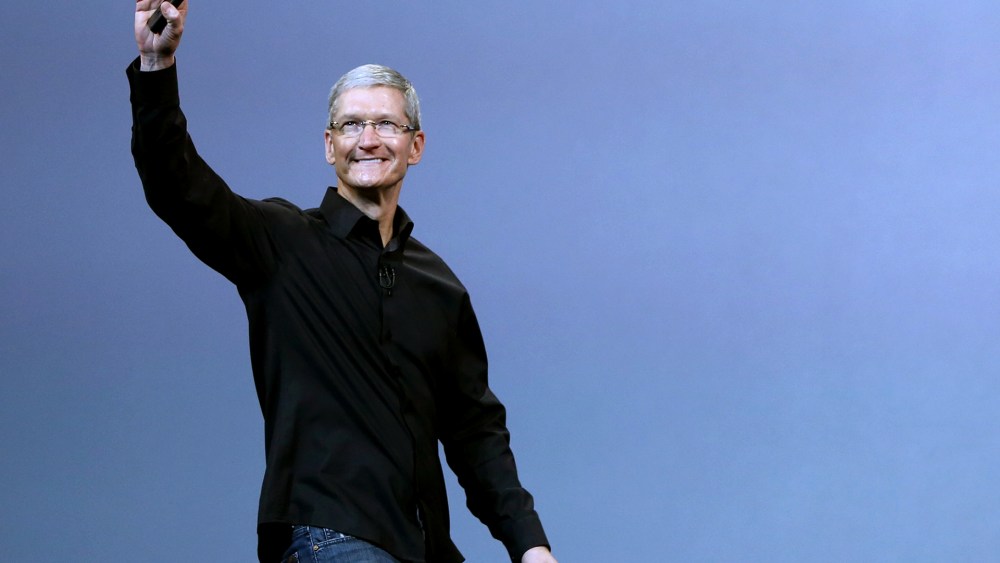 Apple Inc CEO Tim Cook steps out on stage during an Apple event in San Francisco, Calif. on Oct. 22, 2013.