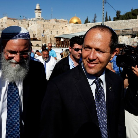 Jerusalem Mayor Nir Barkat walks after praying at the Western Wall in Jerusalem's Old City Oct. 23, 2013. (Photo by Baz Ratner/Reuters)