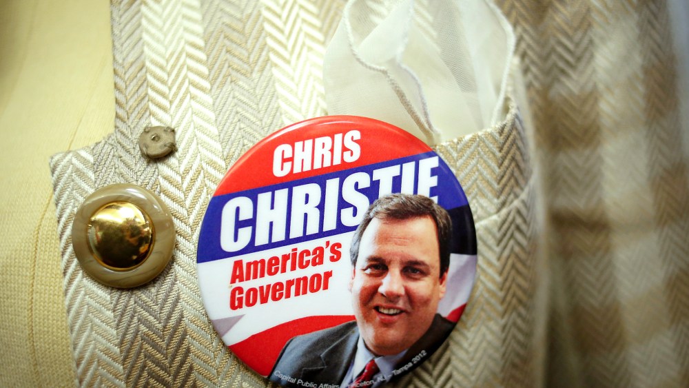 A supporter of New Jersey Governor Chris Christie wears a button during a campaign stop in Nutley Diner in Nutley, N.J. November 4, 2013.