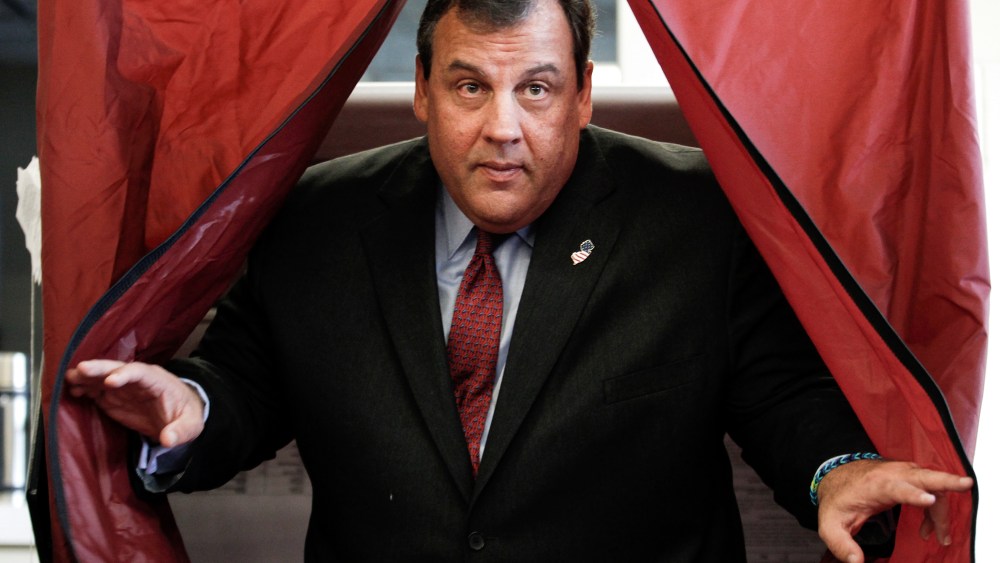 New Jersey Governor Christie exits a polling station after casting his vote during the New Jersey governor election in Mendham Township, New Jersey