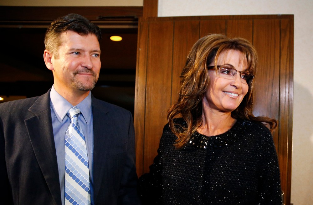 Former Republican governor of Alaska Sarah Palin and her husband Todd arrive for a celebration for evangelist Billy Graham's 95th birthday in Asheville, N.C., Nov. 7, 2013. (Photo by Chris Keane/Reuters)
