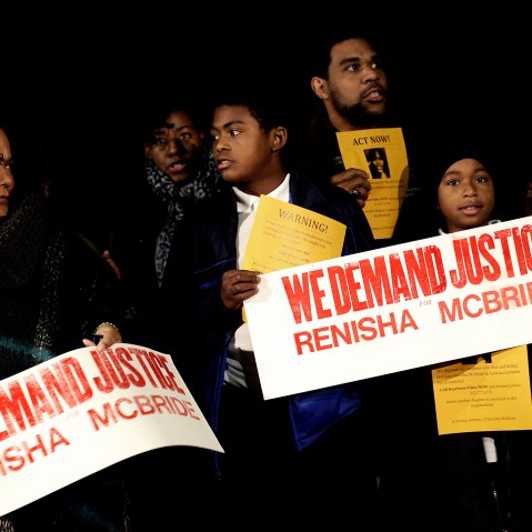 Demonstrators protest the killing of 19-year-old Renisha McBride outside the Dearborn Heights Police Station