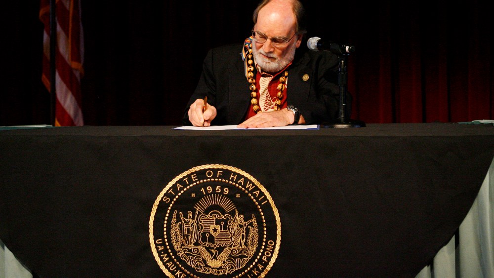 Governor Neil Abercrombie signs a bill allowing same sex marriage to be legal in Hawaii, Nov. 13, 2013.