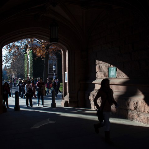 People walk around the Princeton University campus in New Jersey, Nov. 16, 2013.