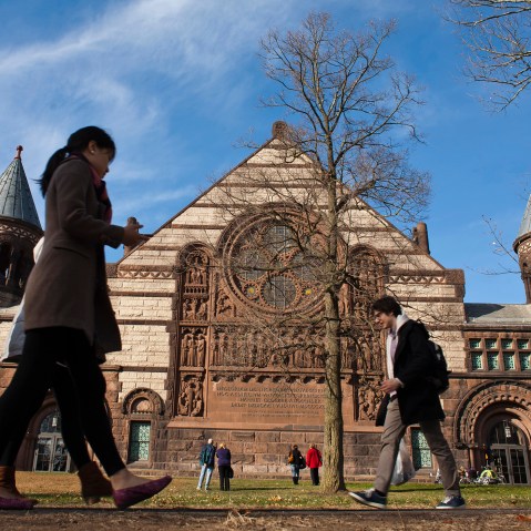 People walk around the Princeton University campus, N.J., Nov. 16, 2013. (Photo by Eduardo Munoz/Reuters)