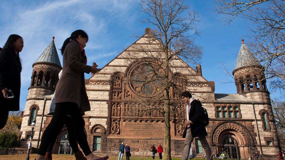 People walk around the Princeton University campus, N.J., Nov. 16, 2013. (Photo by Eduardo Munoz/Reuters)
