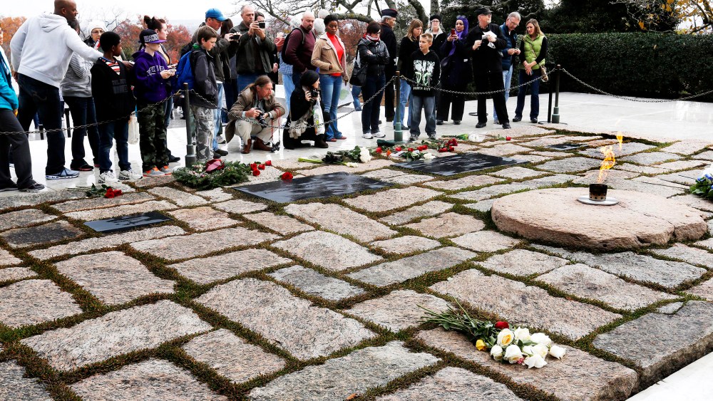 Visitors pay their respect at Arlington National Cemetery, Nov. 22, 2013.