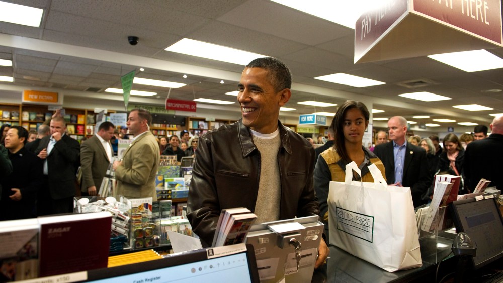 President Barack Obama shops with daughter Malia at Politics and Prose Bookstore and Coffeehouse in Washington, D.C. on Nov. 30, 2013.