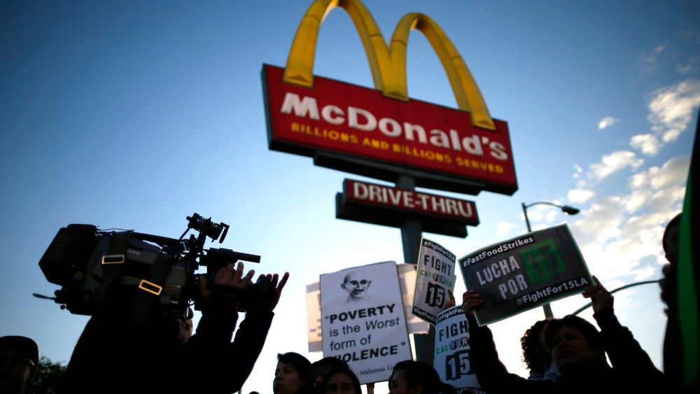 Protesters march outside McDonald's in Los Angeles