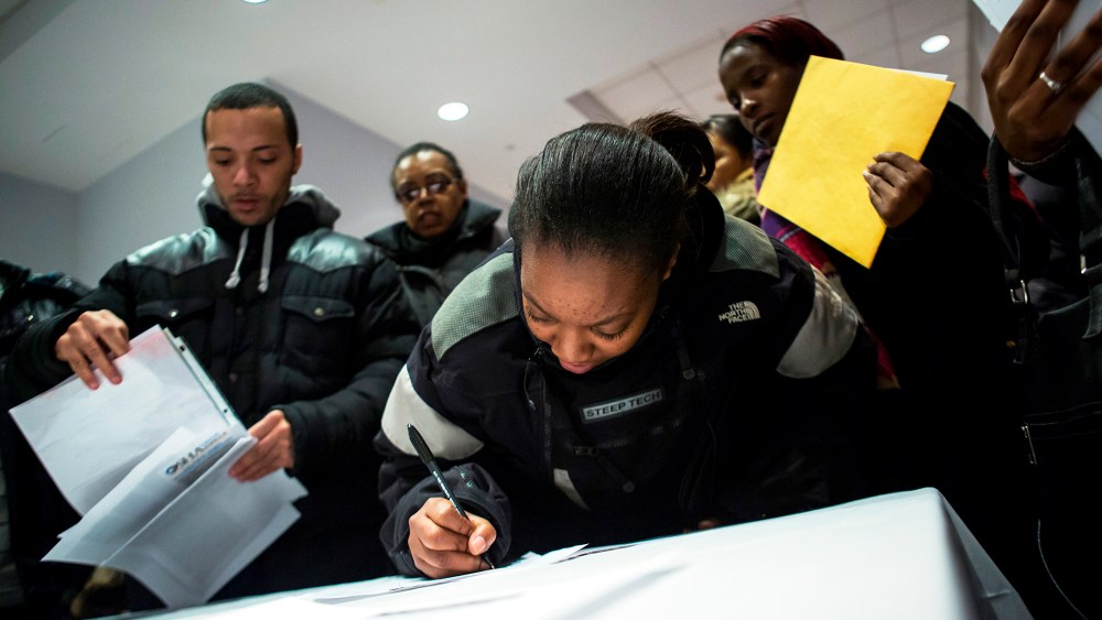 People attend a job training and resource fair at Coney Island in New York December 11, 2013.