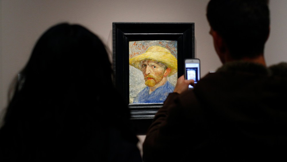 A couple looks at a painting titled "Self Portrait" by artist Vincent van Gogh displayed at the Detroit Institute of Arts in Detroit, Mich. on Dec. 7, 2013.